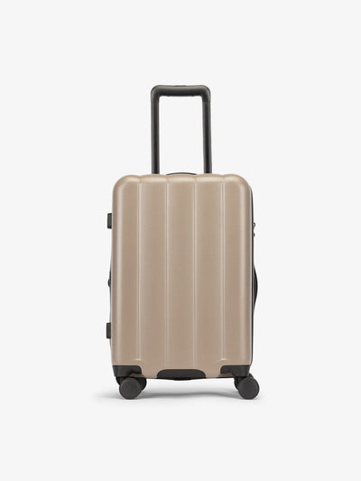Brown chocolate CALPAK carry-on luggage made from an ultra-durable polycarbonate shell and expandable by up to 2; LCO1020-CHOCOLATE view 1